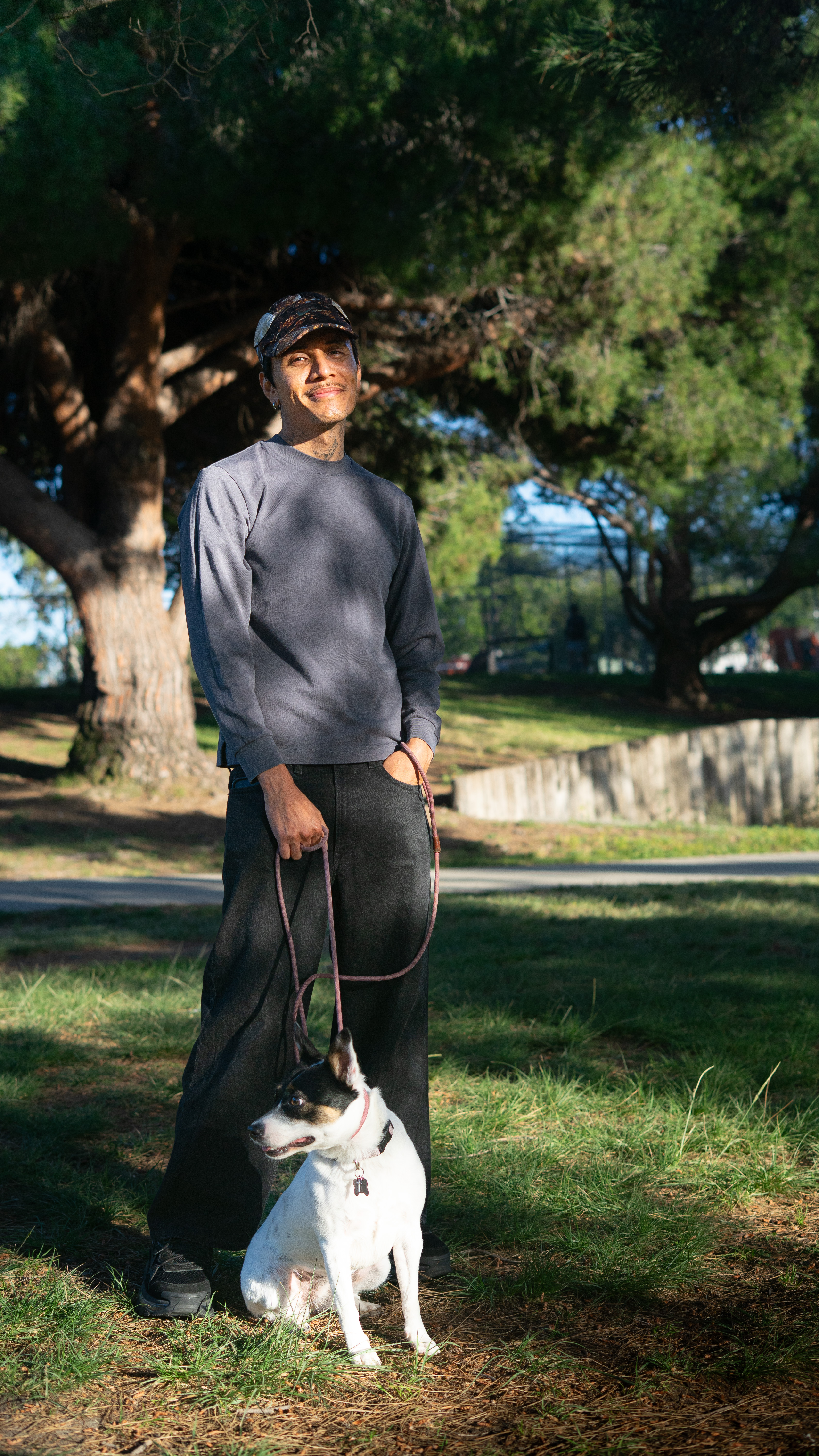 Man walking dog in park
