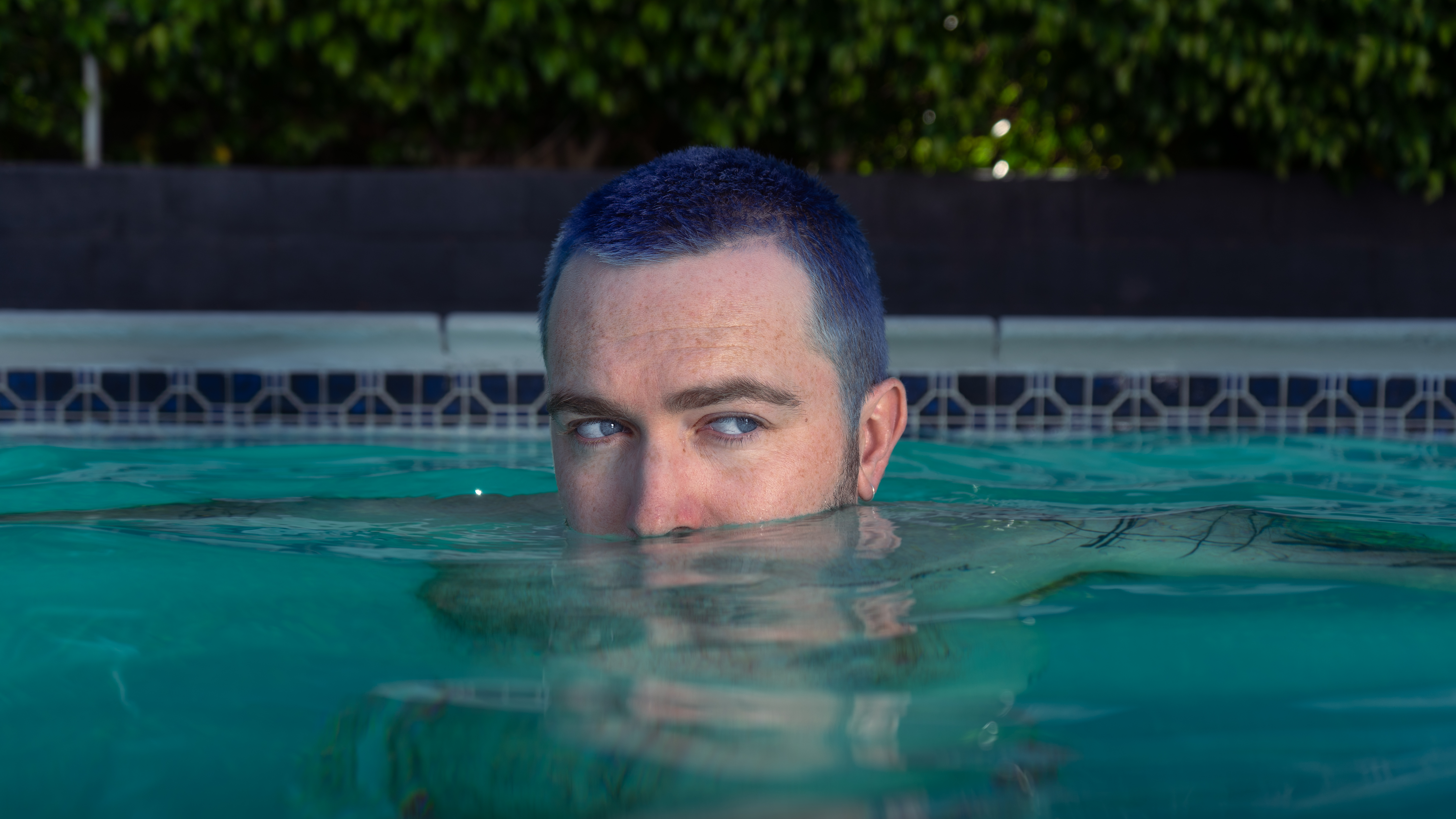 Eyes above water portrait